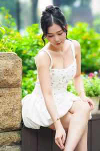 VGU No.3 - Elegant Girl in White Dress Gracing a Lush Green Garden-0