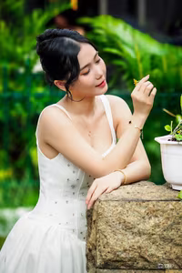 VGU No.3 - Elegant Girl in White Dress Gracing a Lush Green Garden-3