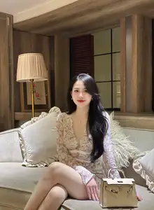 Captivating Beauty: Young Woman in Elegant Lace Dress Shines in Luxurious Restaurant Setting.-12