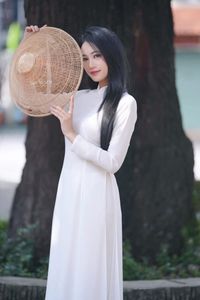 Elegant Vietnamese Girl in Traditional White Ao Dai - Timeless Beauty-13