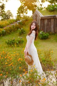 XVG No.2: Serene Beauty A Vietnamese Girl Amidst a Vibrant Flower Garden-10