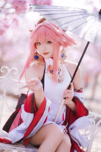 Coser Guaxi Jiang Transforms into Yae Miko Genshin Impact: Enchanting Beauty Amidst Sakura-9
