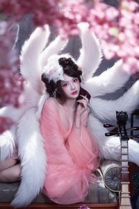 Mesmerizing Nine-Tailed Fox Cosplay: Ethereal Beauty in a Cherry Blossom Garden-10