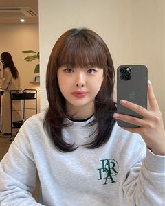 Adorable Girl with Blunt Bangs & Short Hair - Youthful & Charming Style Photo-3