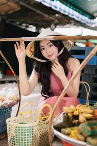 Vietnamese Grace: Elegant Girl in Traditional Flower Market, Discover Vibrant Culture 1000019476-12