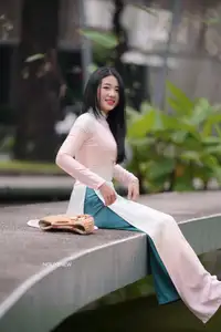 Graceful Vietnamese Lady in Traditional Ao Dai  1000024954-29