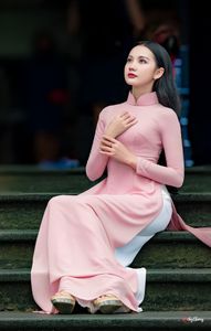 Graceful Vietnamese Woman in Pink Ao Dai: A Stunning Portrayal of Traditional Asian Beauty 1000019457-5