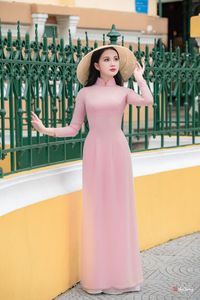Graceful Vietnamese Woman in Pink Ao Dai: A Stunning Portrayal of Traditional Asian Beauty 1000019457-2