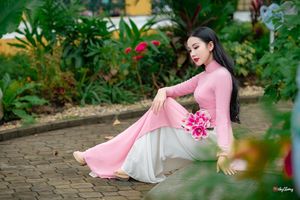 Graceful Vietnamese Woman in Pink Ao Dai: A Stunning Portrayal of Traditional Asian Beauty 1000019457-13
