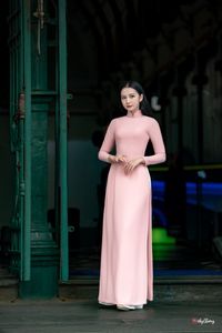 Graceful Vietnamese Woman in Pink Ao Dai: A Stunning Portrayal of Traditional Asian Beauty 1000019457-1