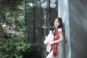 Radiant Student in Graduation Gown Captures Memorable Moment of Success and Joy for a Bright Future.-10
