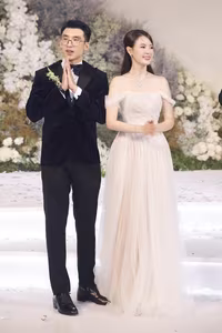 Witness Do Thi Ha's enchanting transformation into a radiant princess in a stunning white wedding gown-3