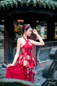 Elegant Asian Beauty in Red Dress Shines Gracefully Amidst a Traditional Garden 1000024509-1