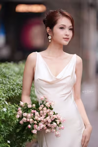 VGU No.11: Elegant Charm: A Woman's Grace in White Gown and Delicate Rose Bouquet-10