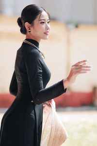 Graceful Vietnamese Woman in Elegant Black Ao Dai-9