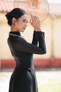 Graceful Vietnamese Woman in Elegant Black Ao Dai-6