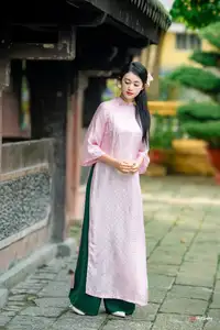 VGU No.163: The Graceful Beauty of a Vietnamese Girl in Traditional Pink Ao Dai Amidst Ancient Architecture-8