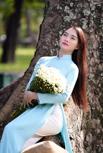 VGU No.113 Elegant Vietnamese Girl in Blue Ao Dai Captures Timeless Beauty Amidst Nature Serenity-4