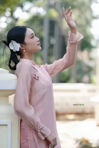 Timeless Beauty: Elegant Vietnamese Girl in Graceful Pink Ao Dai 1000024694-11