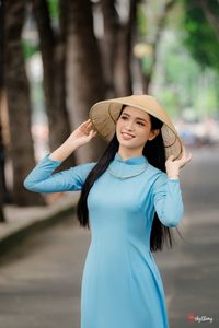 Graceful Vietnamese Woman in Blue Ao Dai Elegant Traditional Beauty-9