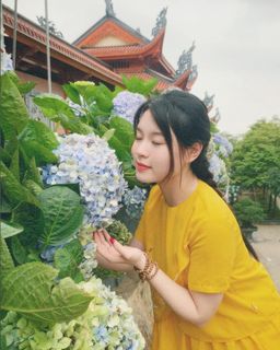 Serene Moments with Hydrangeas: A Young Woman's Nature Portrait-4