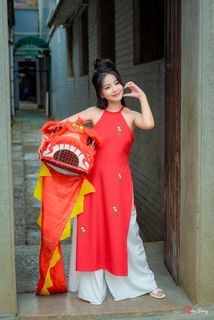 Vietnamese Cultural Beauty: Girl in Red Ao Dai & Traditional Lion Dance Prop-5
