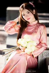 Captivating Serenity: Vietnamese Girl in Pink Ao Dai with Lotus Flowers1730591-9