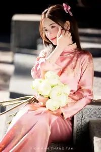 Captivating Serenity: Vietnamese Girl in Pink Ao Dai with Lotus Flowers1730591-17