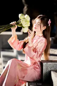 Captivating Serenity: Vietnamese Girl in Pink Ao Dai with Lotus Flowers1730591-14