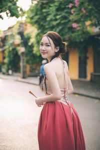 Vietnamese Woman's Beauty Amidst Hoi An Ancient Town, by Iconic Japanese Covered Bridge-2