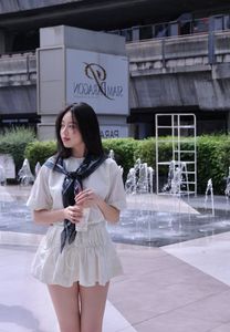 Miss Thanh Thuy's Dynamic Gen Z Style in Thailand: Chic Polo Dress Street Style-9