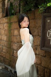 Graceful Vietnamese Girl in Traditional Conical Hat-0