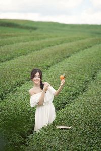 Serene Girl Embracing Nature & Book in Lush Green Tea Hill-10