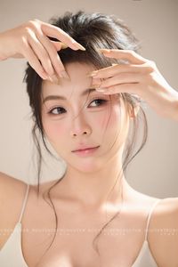 Close-up Portrait of a Woman with Natural Beauty and Gentle Expression-1