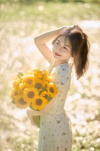 Charming Beauty with Sunflowers in a Natural Landscape-0