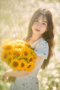 Charming Beauty with Sunflowers in a Natural Landscape-1