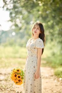 Charming Beauty with Sunflowers in a Natural Landscape-4