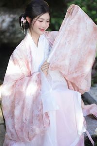 Explore East Asian Traditional Beauty: An Elegant Muse in Soft Pastel Attire.-7