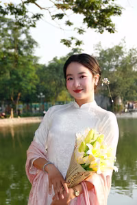 VGU No.148: Radiant Smile in Traditional Ao Dai: Elegant Vietnamese Beauty by the Lake.-10