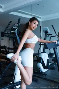 Model FE's captivating gym style in sleek white athletic wear | XiuRen No.10621-16