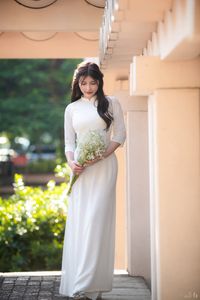 Graceful Vietnamese Girl in Pristine White Ao Dai: Timeless Beauty.-14