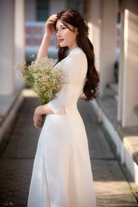 Graceful Vietnamese Girl in Pristine White Ao Dai: Timeless Beauty.-15