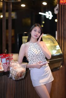 Elegant Beauty of a Young Vietnamese Girl in a Cafe Setting-10