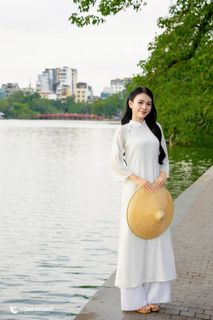 Gentle Vietnamese Woman in White Ao Dai by Hoan Kiem Lake | Serene Beauty of Vietnam-2