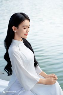 Gentle Vietnamese Woman in White Ao Dai by Hoan Kiem Lake | Serene Beauty of Vietnam-3