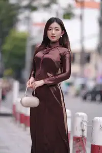 Elegant Modern Ao Dai Beauty Captivates on City Streets | Graceful & Alluring 1000025274-0