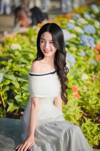 Radiant Beauty of a Vietnamese Girl with a Bright Smile in Nature-2