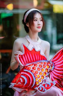 Elegant Vietnamese Beauty with Traditional Fish Lantern, Celebrating Culture-5
