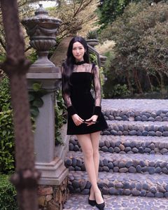 XVG No.3: Elegant Girl in Black Dress Amidst Ancient Garden Charm-4