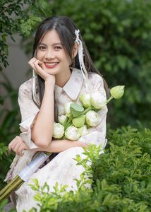 Elegant Vietnamese Woman with Pure Lotus Flowers-1